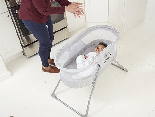 baby sleeping in Primo Cocoon bassinet