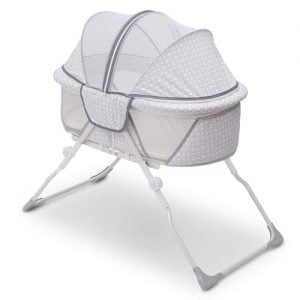 Delta Children EZ Fold Ultra Compact Travel bassinet with net