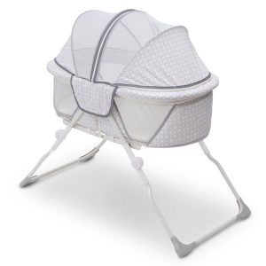 full size canopy of the Delta Children EZ Fold Ultra Compact Travel Bedside Bassinet