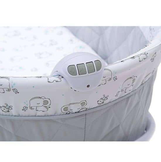 soothing device of the Delta Children Deluxe 2-in-1 Moses Bedside Bassinet