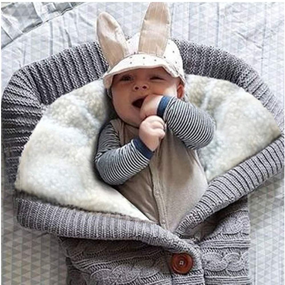 Baby in XMWEALTHY Swaddle Blankets Stroller